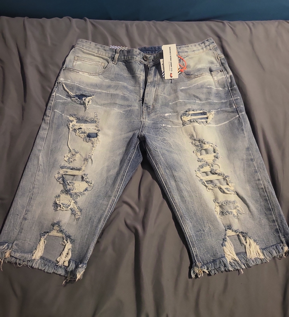 Distressed Light Blue Denim Cutoff Shorts